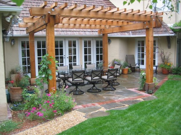 Great patio with pergola by Sutherland Landscape