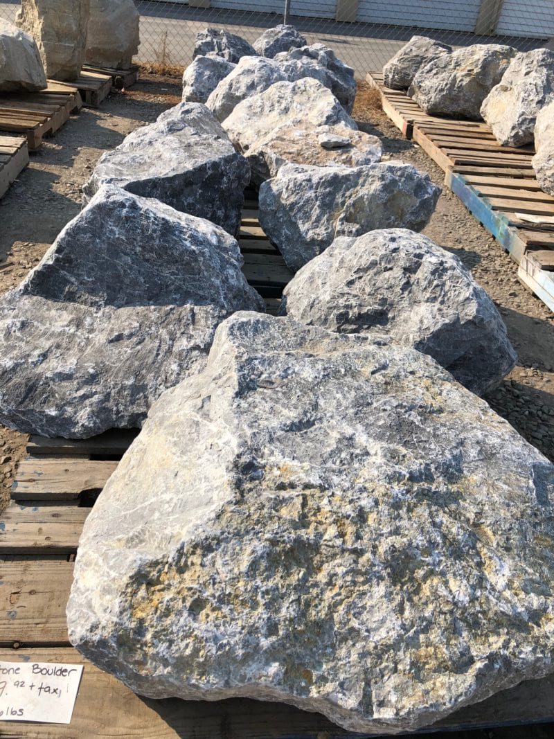Mészkő sziklák tereprendezése